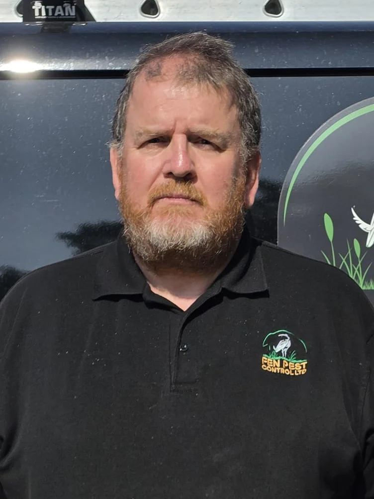 Mark From Fen Pest Control in front of Fen Pest vehicle